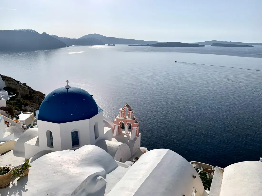 Santorini landscape over the caldera — blue domes and sea views in the Cyclades